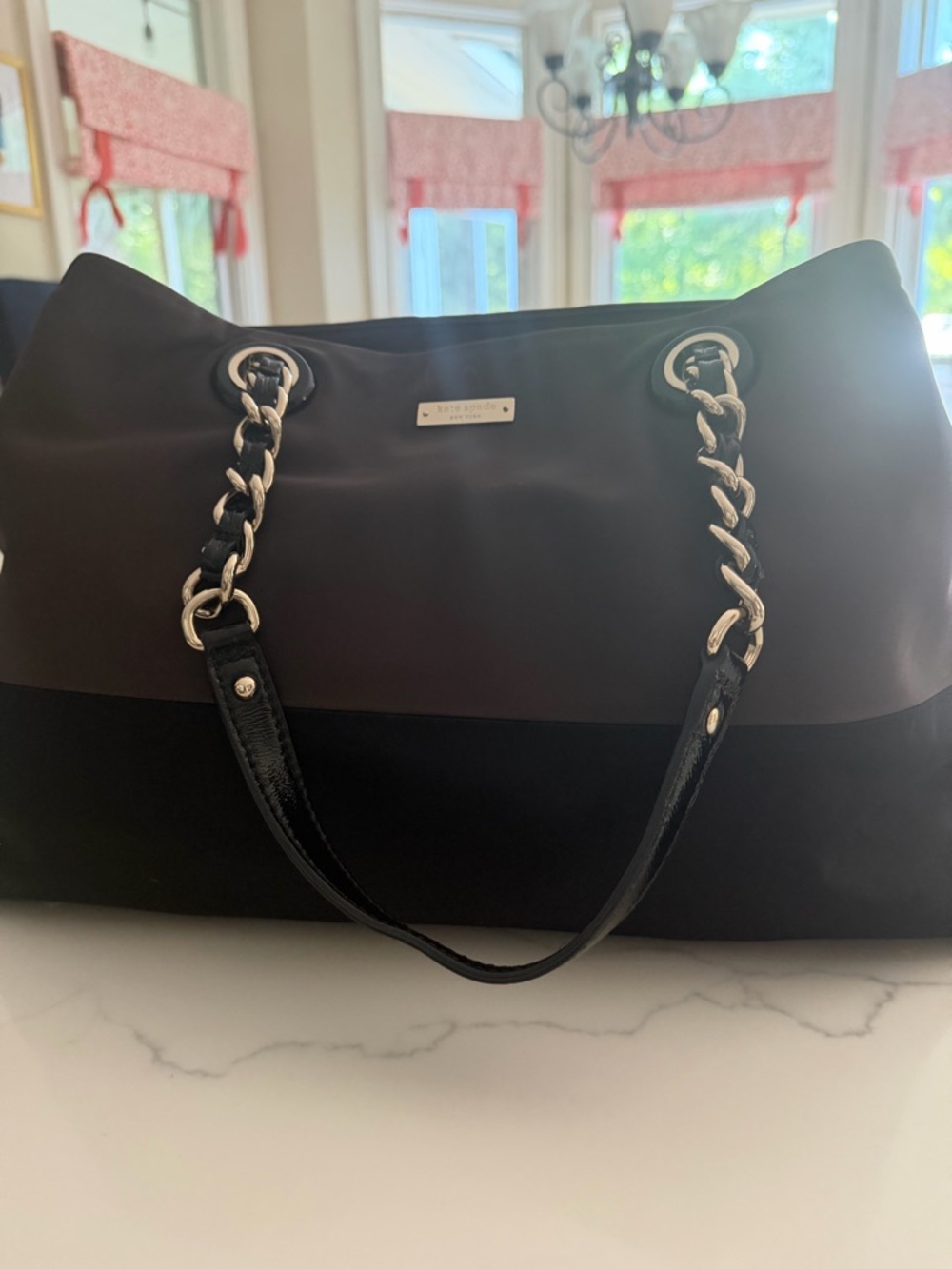 kate spade brown and black bag with gold accents